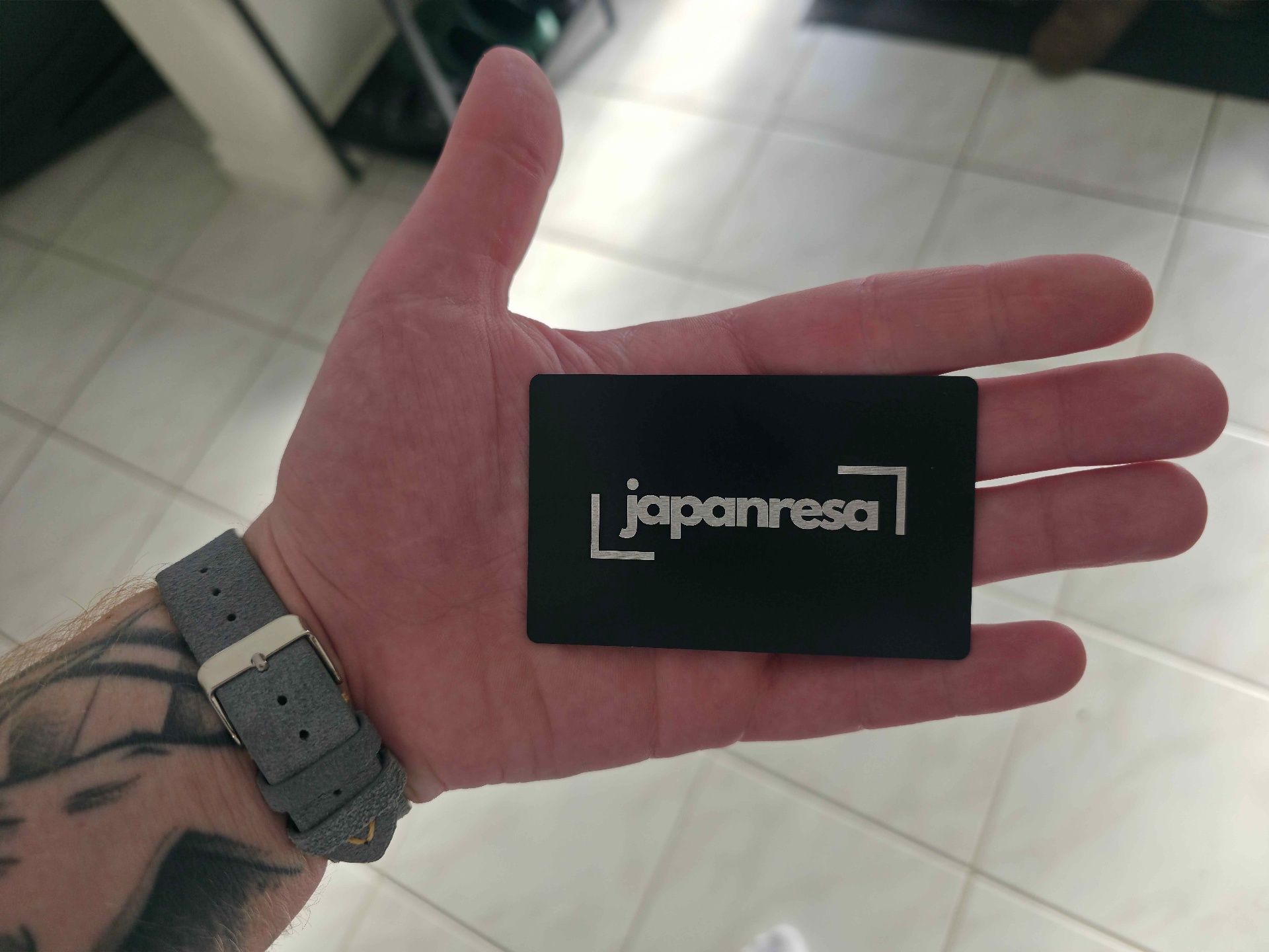 Japanresa kostkort framsida med logotyp
